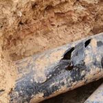Damaged pipe being lined